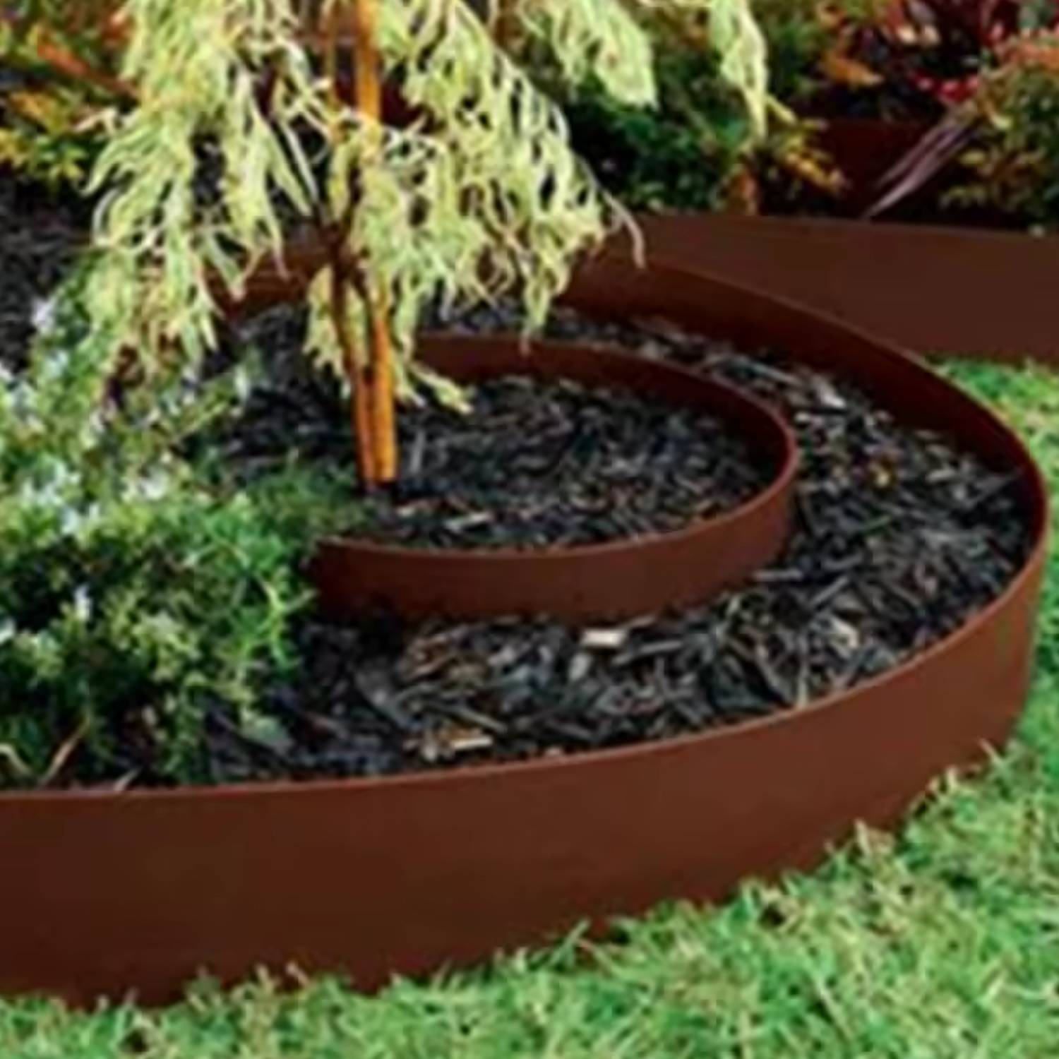 Metal lawn edging holding a garden bed line